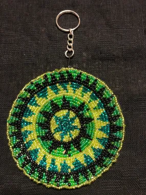 Guatemalan handcrafted glass bead round change purse with key ring. 3.5” diameter.