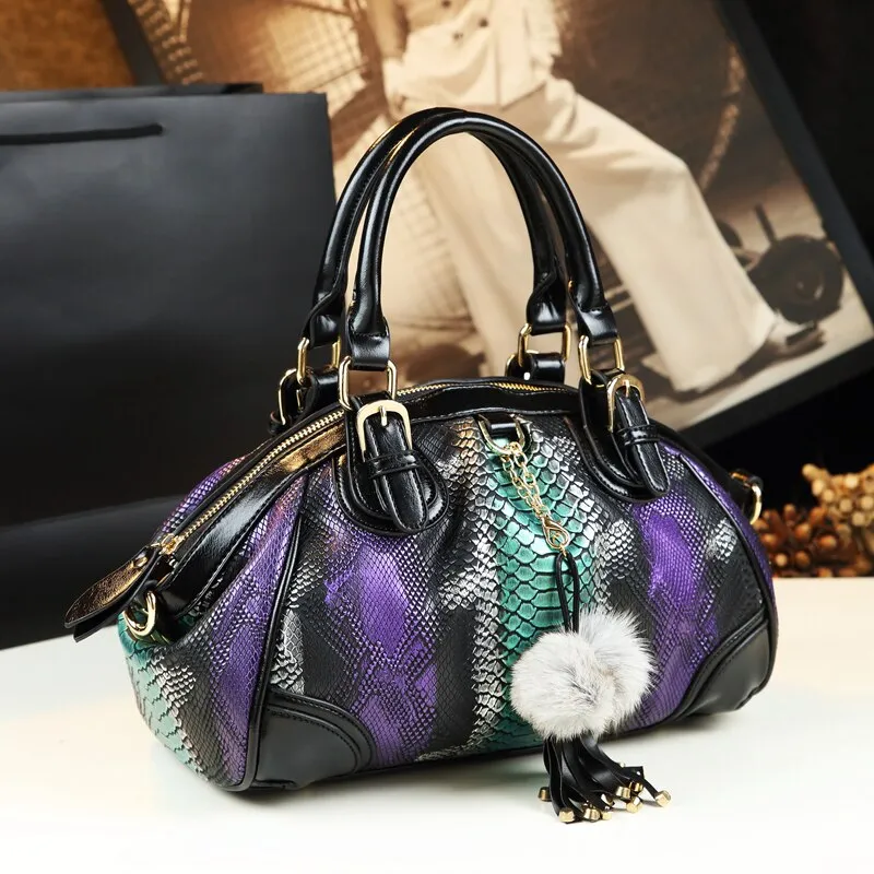 Women's Serpentine Pattern Leather Tassel Dumpling Portable Handbag